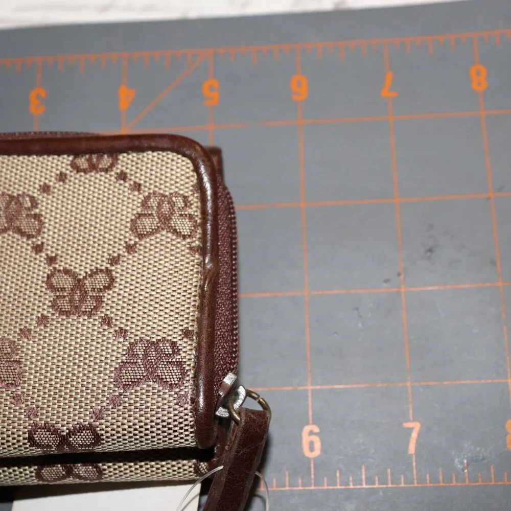 🦋 Designer Trifold Wallet · NWT · Beige & Brown with Brass Rivets